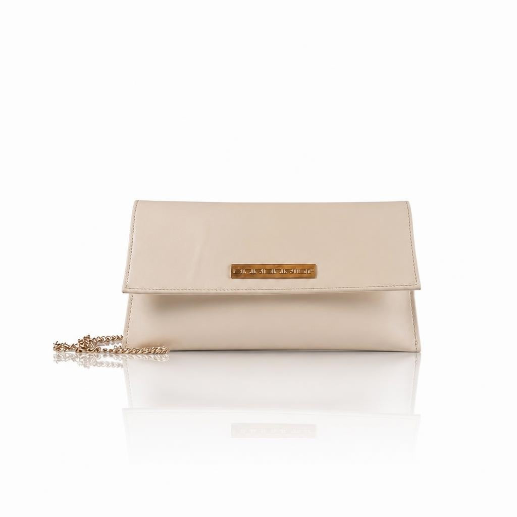Laura – Pochette artigianale in pelle di vitello con patta